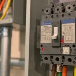 Gray residential electrical service panel and meter base